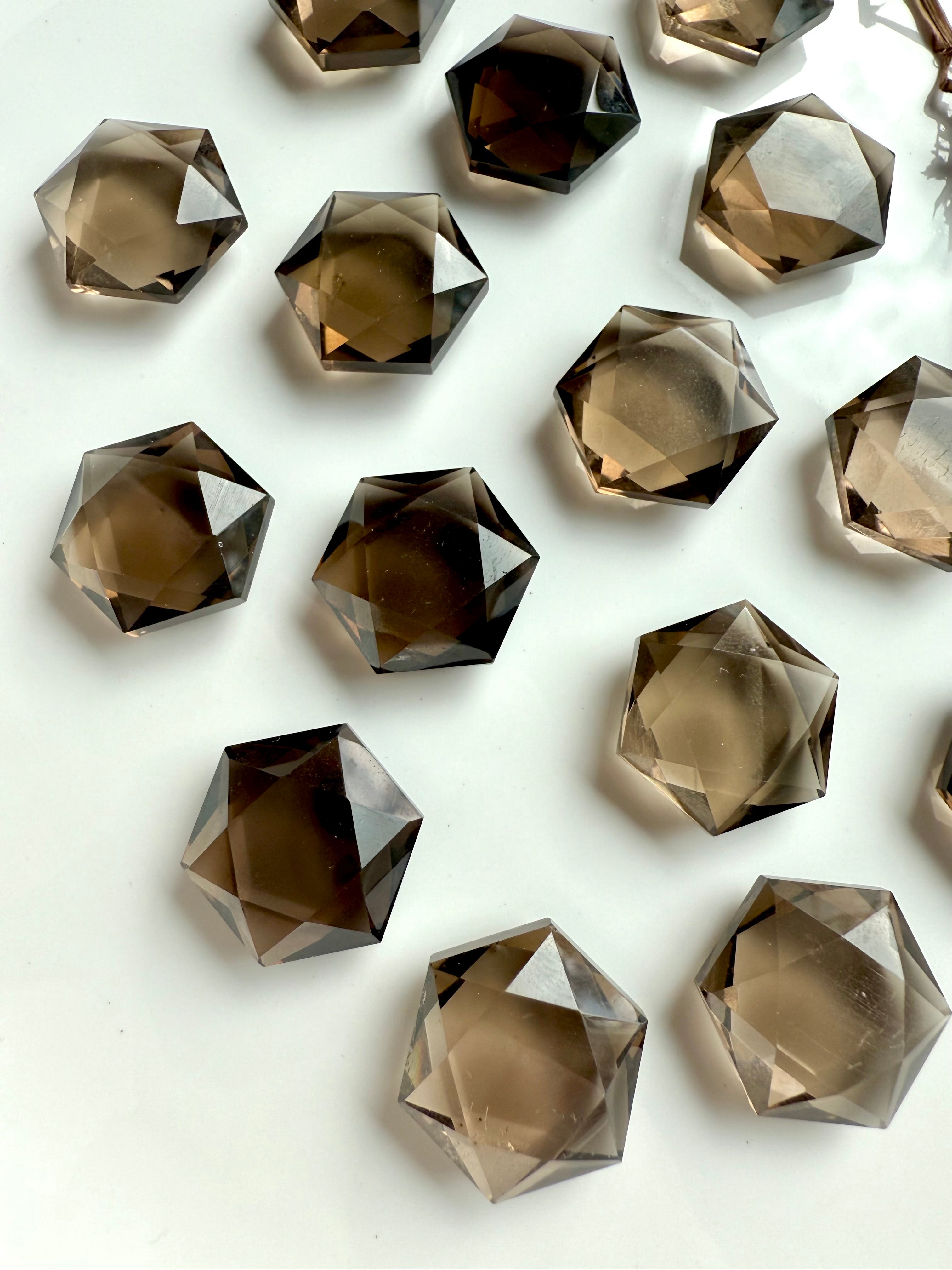 Smoky Quartz faceted hexagon gemstone with luminous polish and grounding Root Chakra energy