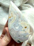 Moss Agate flame crystal with rare orbicular patterning and luminous quartz