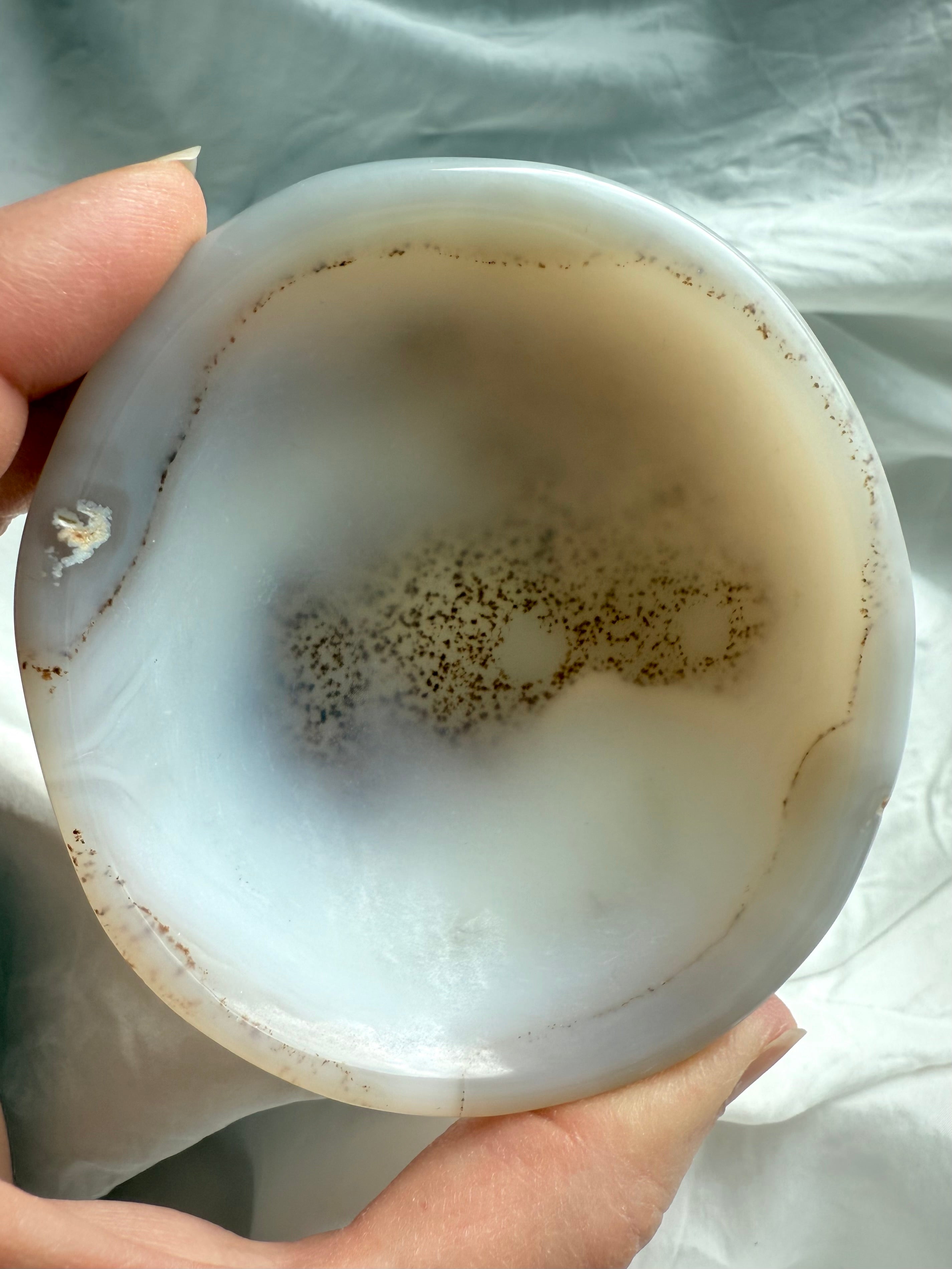 White Agate bowl interior close-up showing natural inclusions – crystal offering dish for meditation & harmony