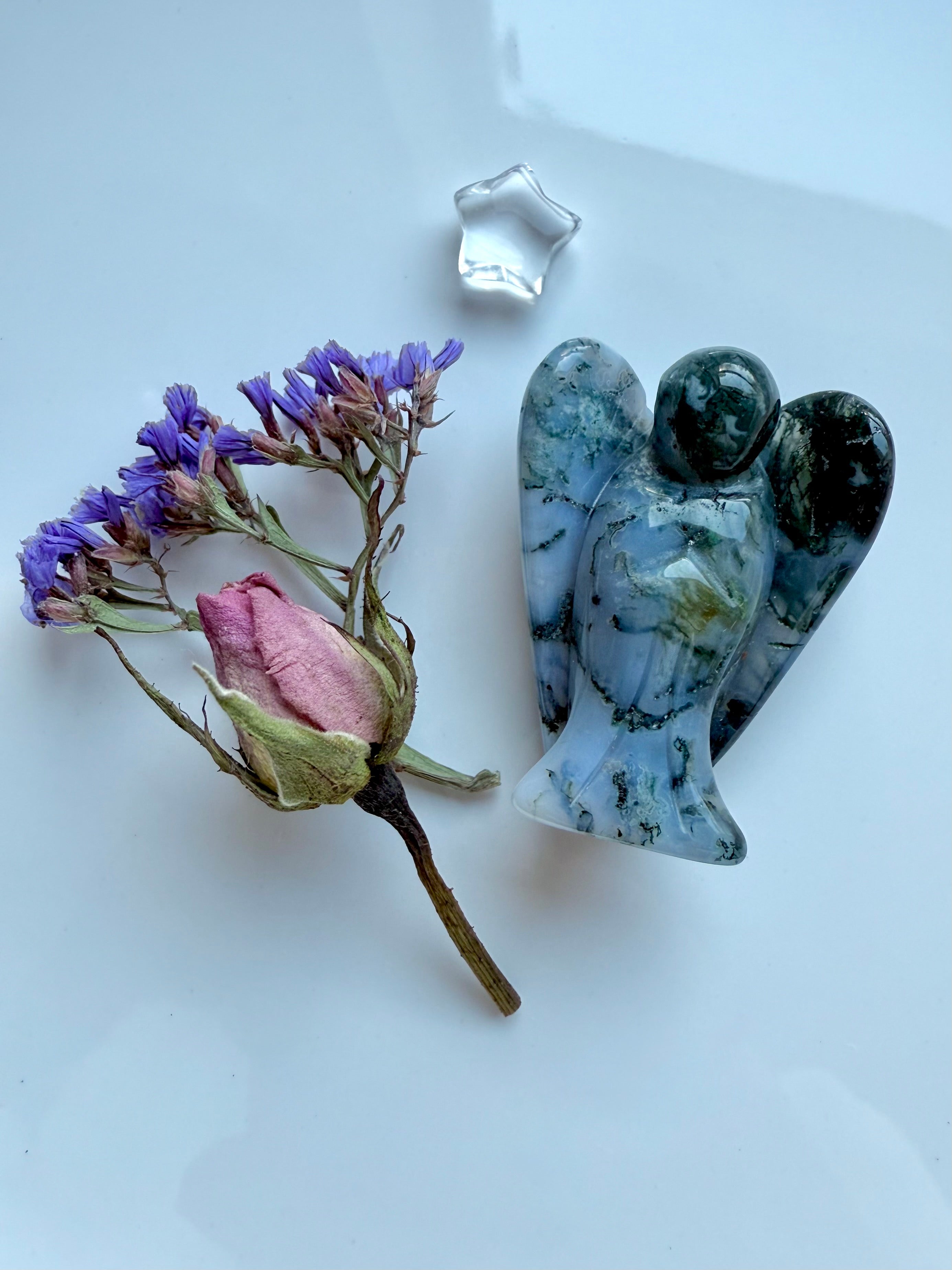 Hand-carved Moss Agate angel figurine with Clear Quartz star and dried flower bouquet.