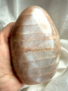 Tall Peach Moonstone freeform carving with subtle shimmer and grounding feminine energy