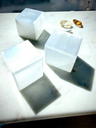 Selenite cubes with luminous white satin spar crystal for cleansing, charging and energy clearing