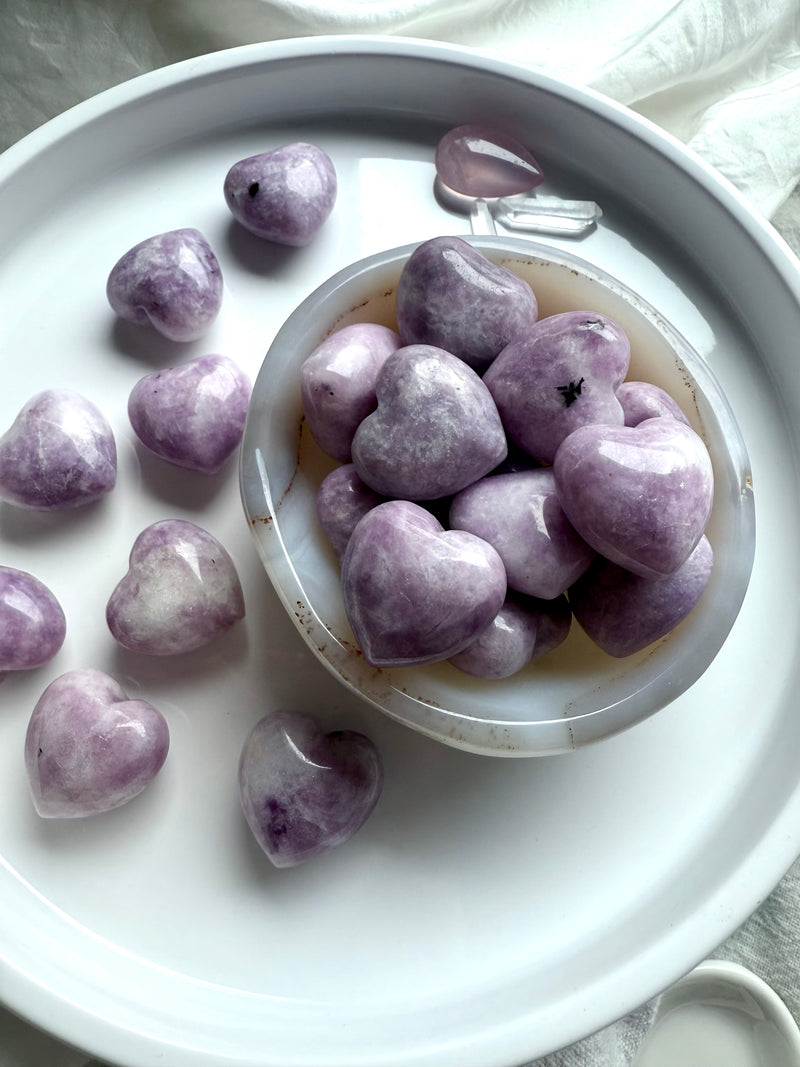 Lepidolite puffy hearts make a soothing pocket stone for stress relief + emotional support. 