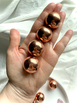 Michigan copper spheres shown on my hand for scale