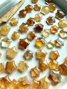 Golden Healer Quartz mini star carvings with golden Hematoid inclusions for healing energy, manifestation, and crystal grids
