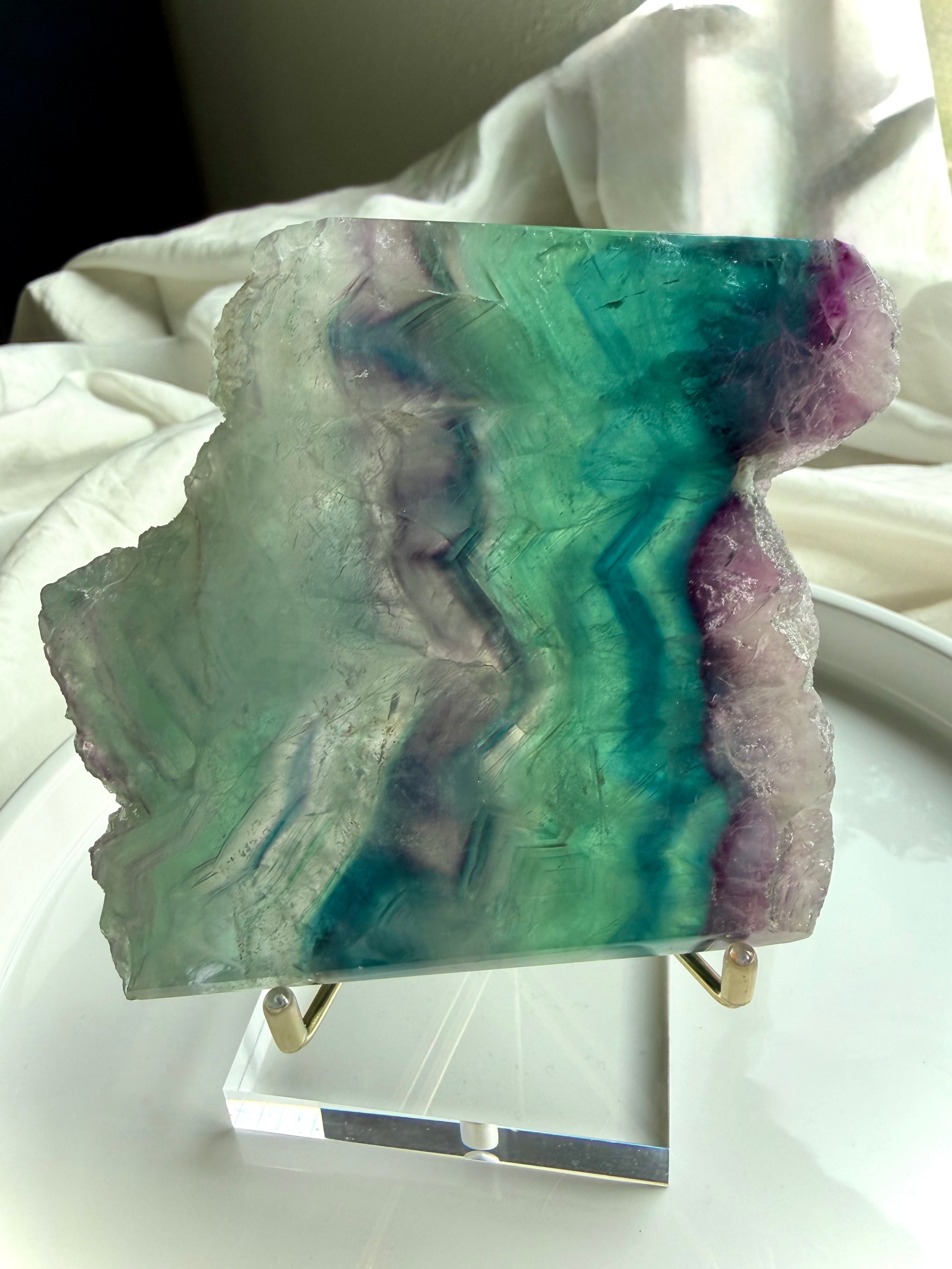 One of a kind fluorite slab shown on optional stand