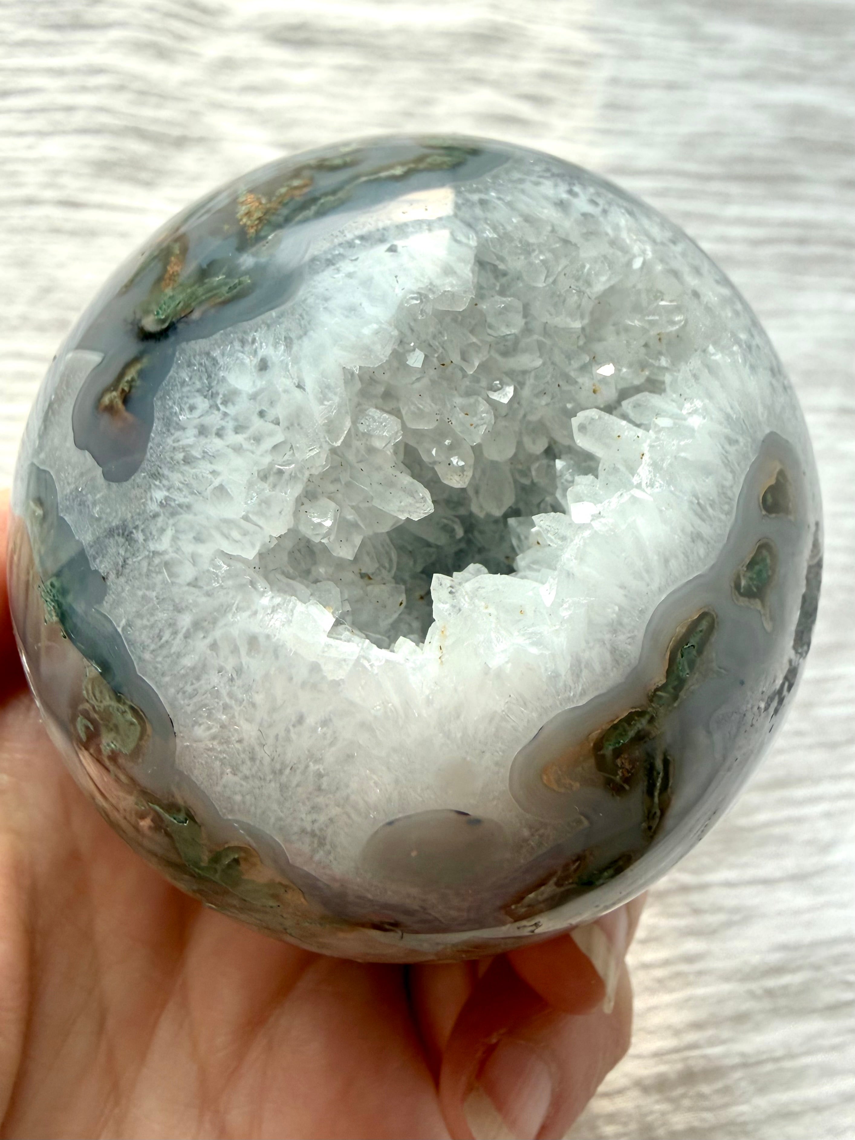 Quartz geode cave in Moss Agate sphere with sparkling crystal points, white Quartz and delicate gray chalcedony banding
