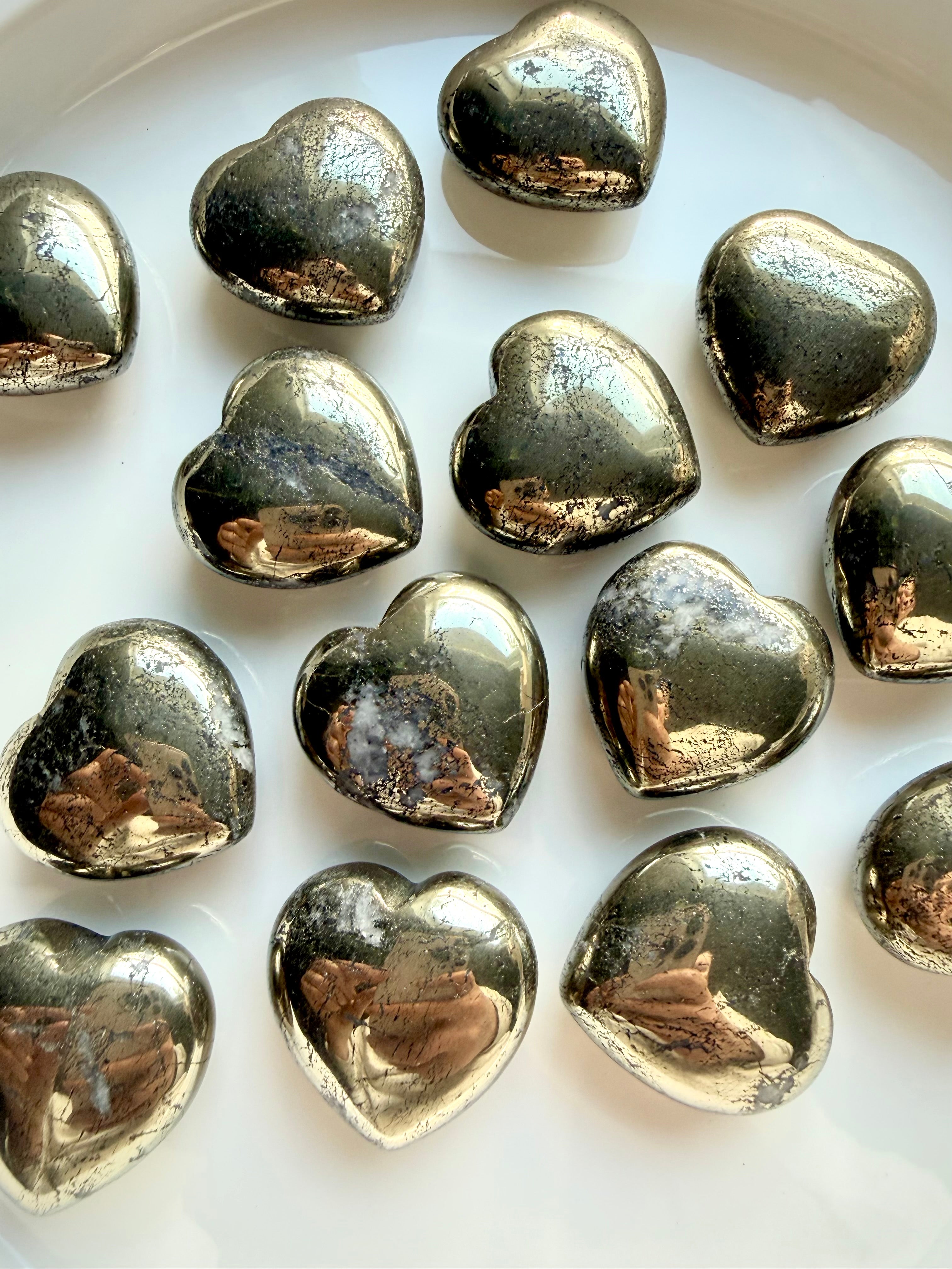 Array of pyrite heart crystals with brassy gold sheen, protective stone for confidence & prosperity