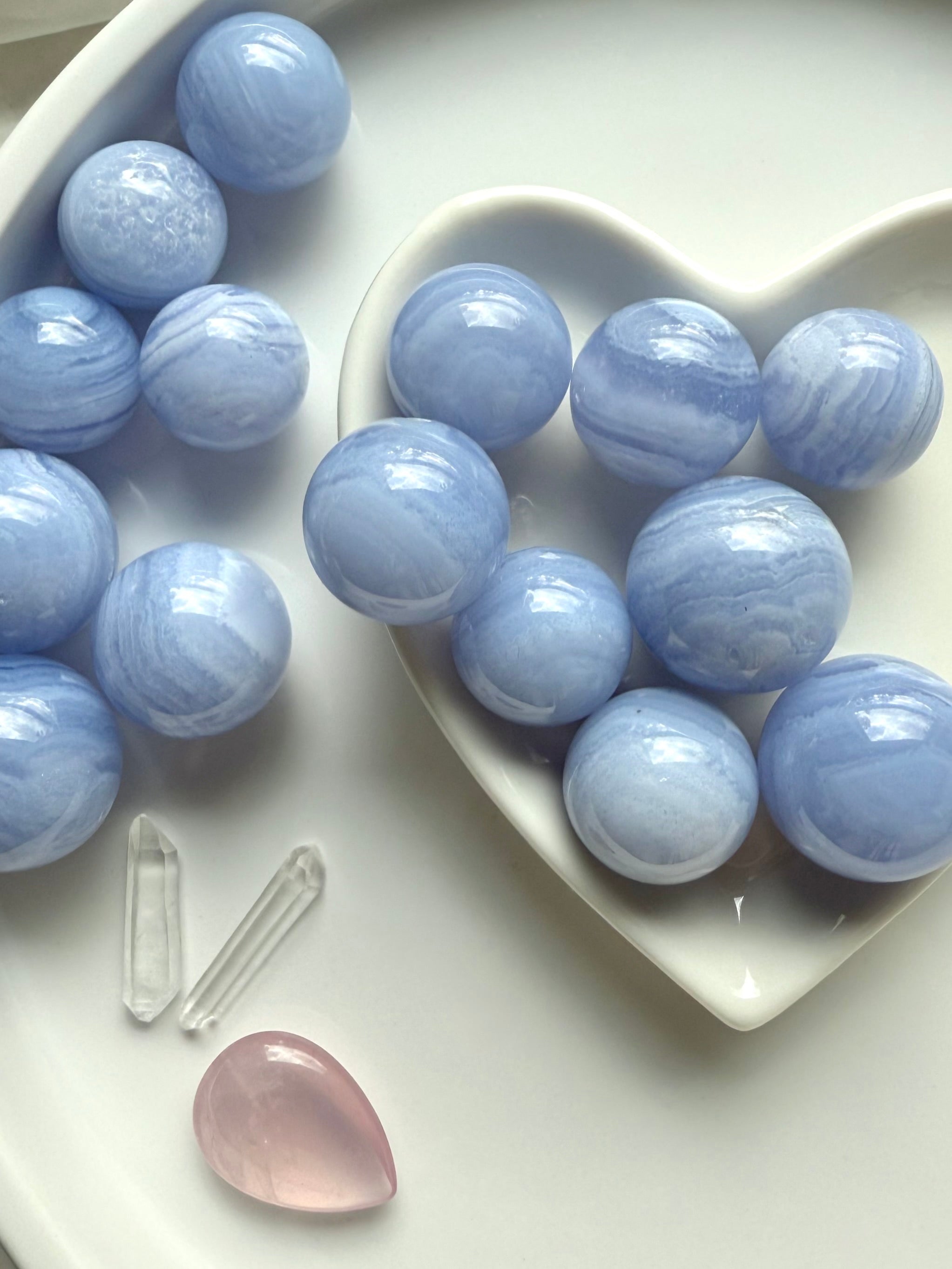 Mini Blue Lace Agate Spheres bring relaxation, peace + tranquility, opening the throat chakra.