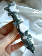 Moss Agate crystal star knife carving with flowing green inclusions and polished ceremonial blade shape