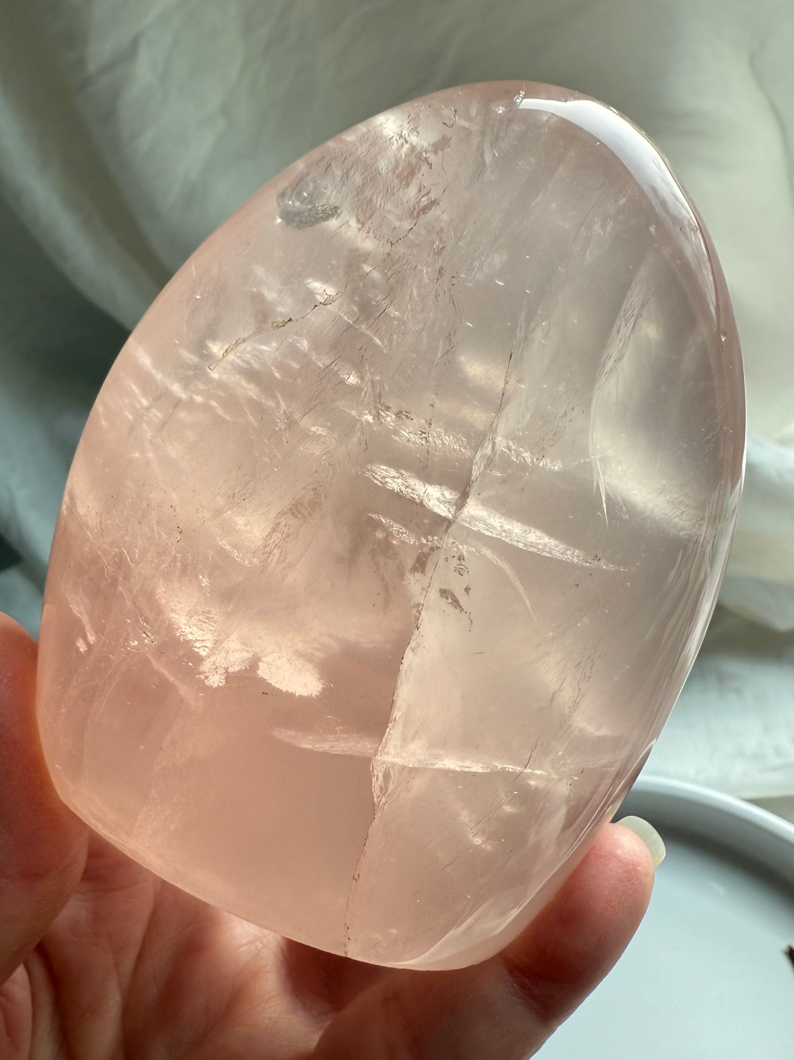 Rose Quartz freeform with soft pink translucence and subtle star-like asterism in natural light