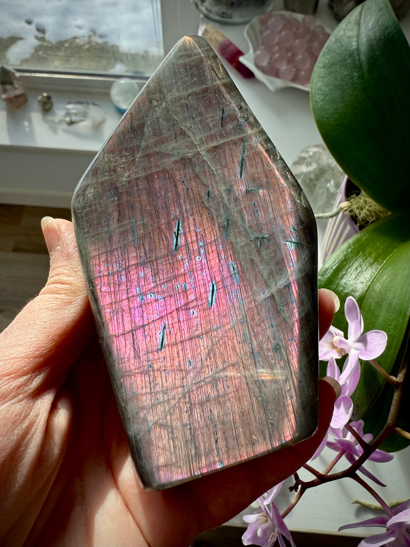 A rare pastel labradorite freeform tower with an electric pink sunset flash