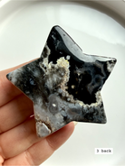 black flower agate star carving #3 back showing organic mineral patterning and natural variation
