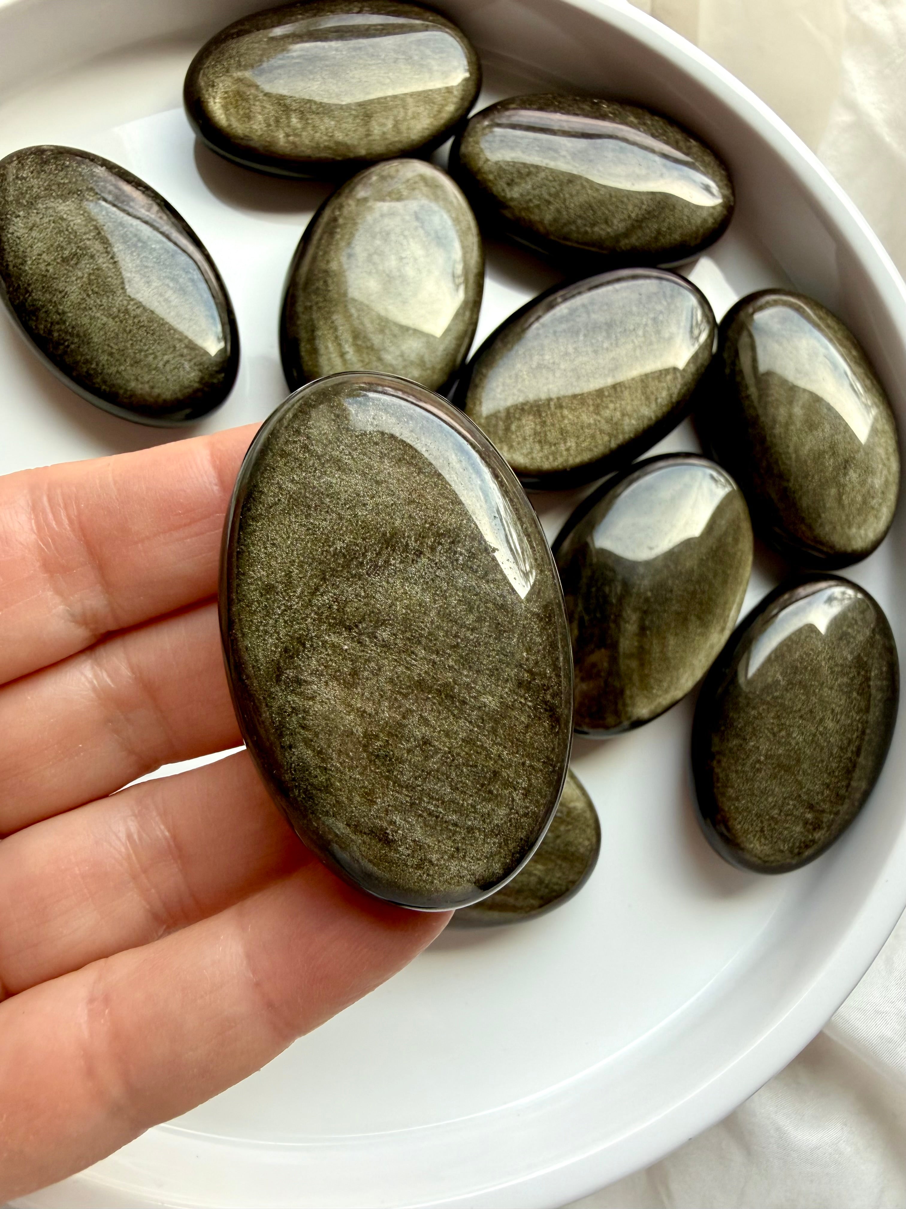 Golden Sheen Obsidian palm stones with luminous gold and bronze sheen for Root Chakra grounding and energetic protection