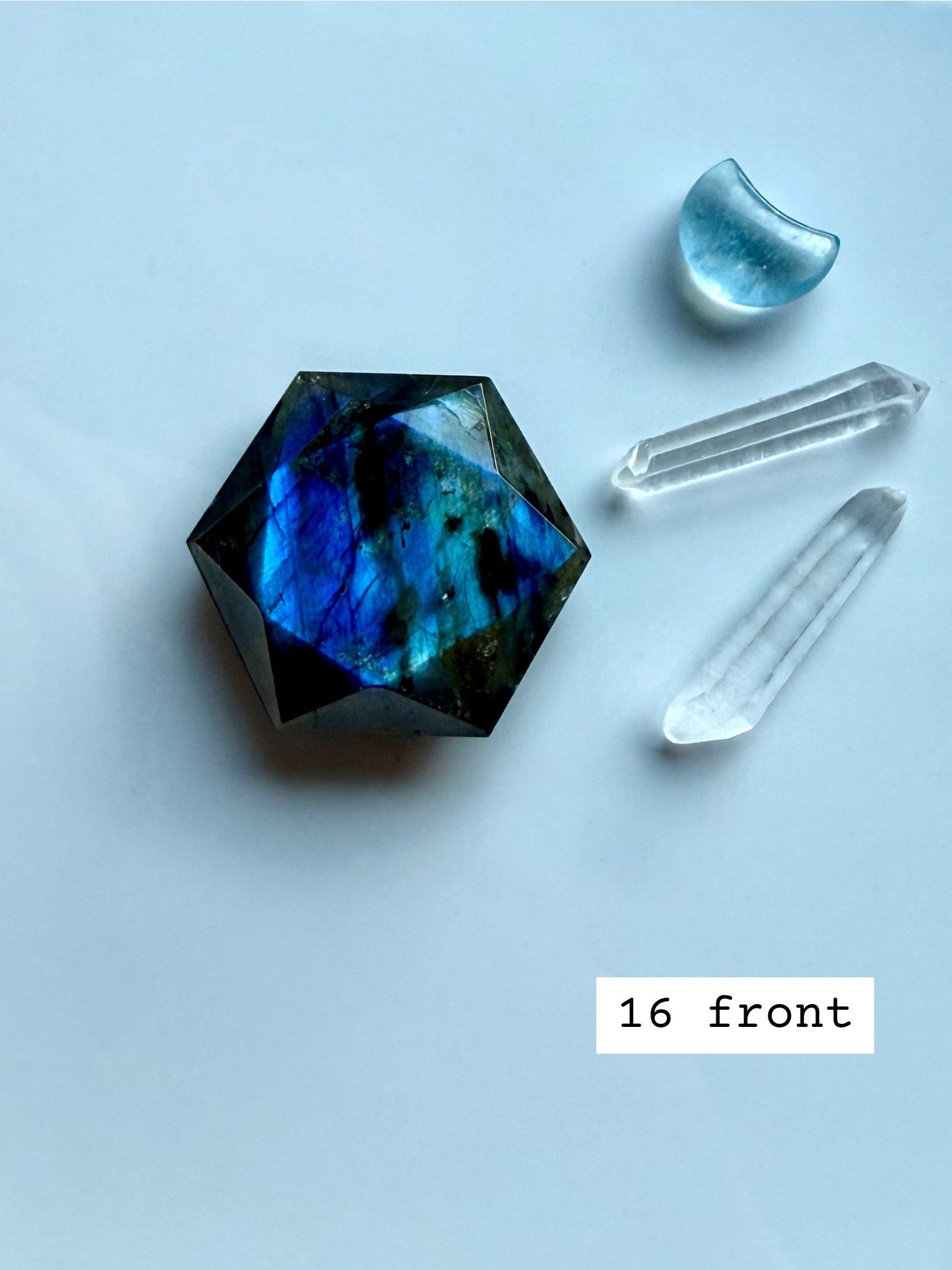 faceted labradorite hexagon with vivid blue flash styled with quartz points crystal star of david for intuition and spiritual vision