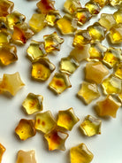 Detailed view of Mini Amber Stars – warm-toned healing crystals for personal power and vitality