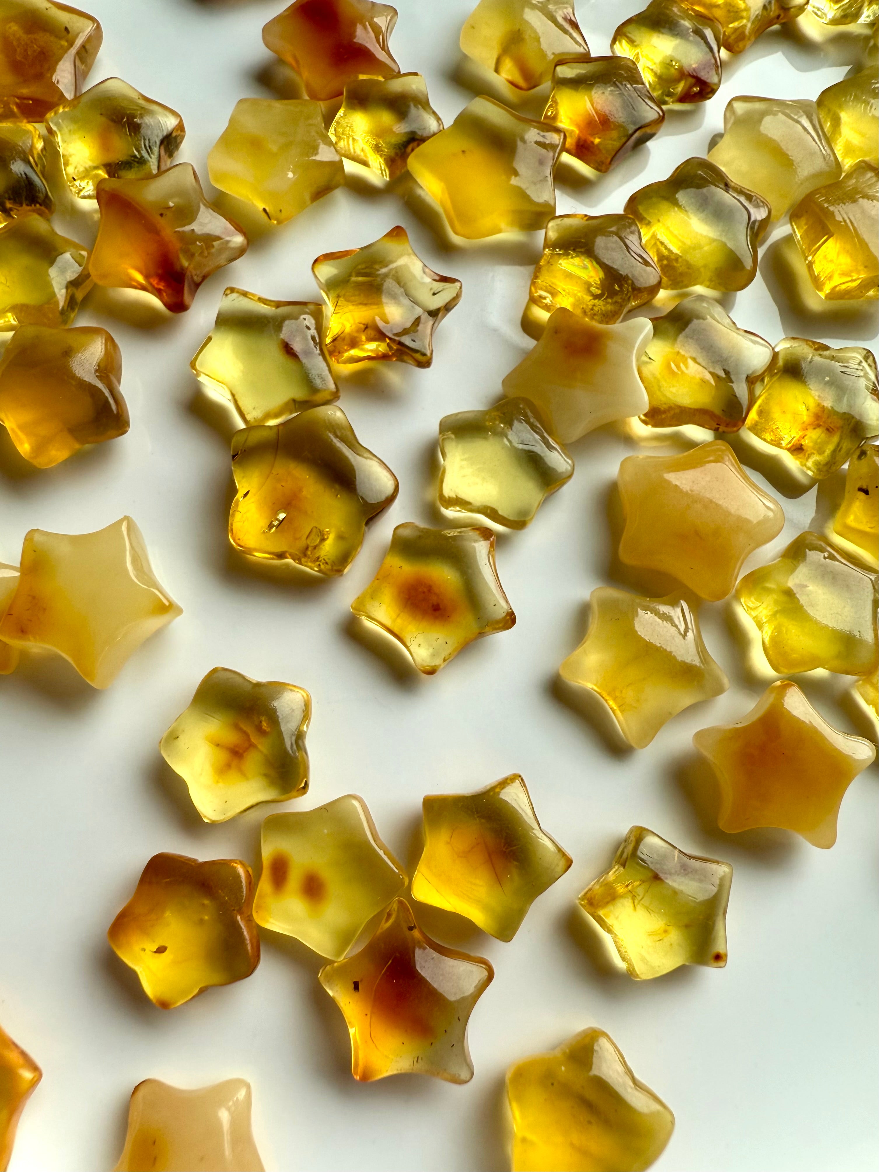 Detailed view of Mini Amber Stars – warm-toned healing crystals for personal power and vitality