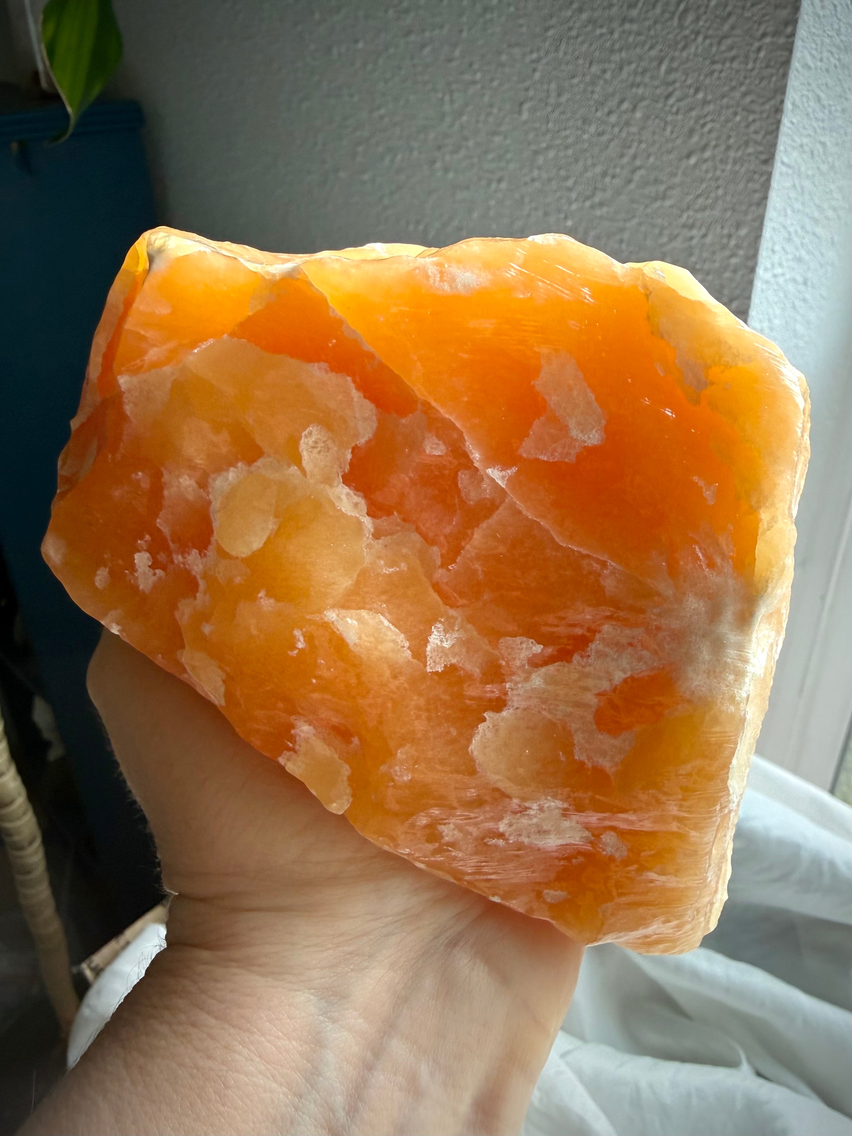 Large self-standing Orange Calcite crystal with bold natural formations and rich honey-orange coloration