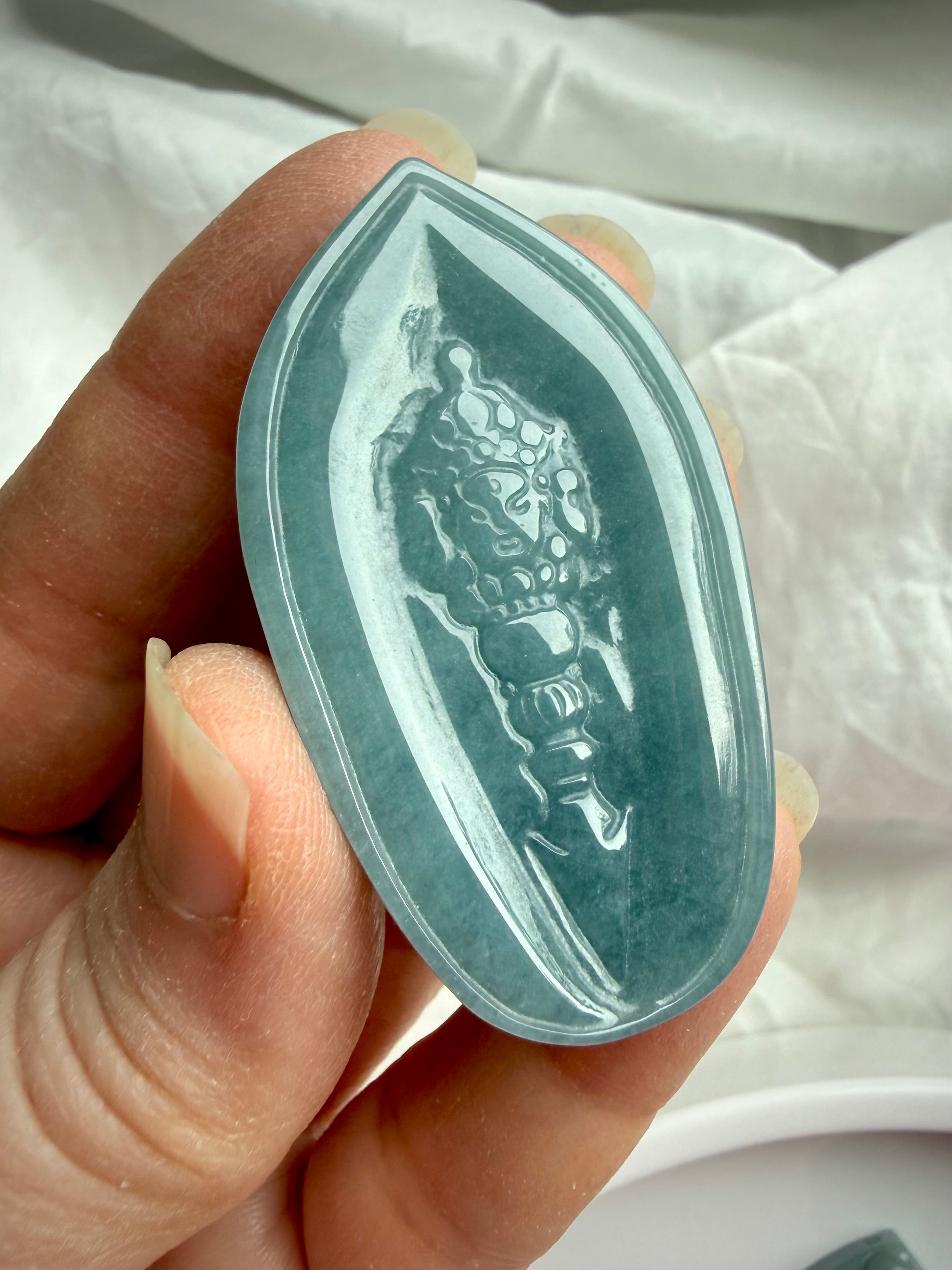 Blue Water Jade Quan Yin pendant carving with Phurba ritual dagger symbol on back