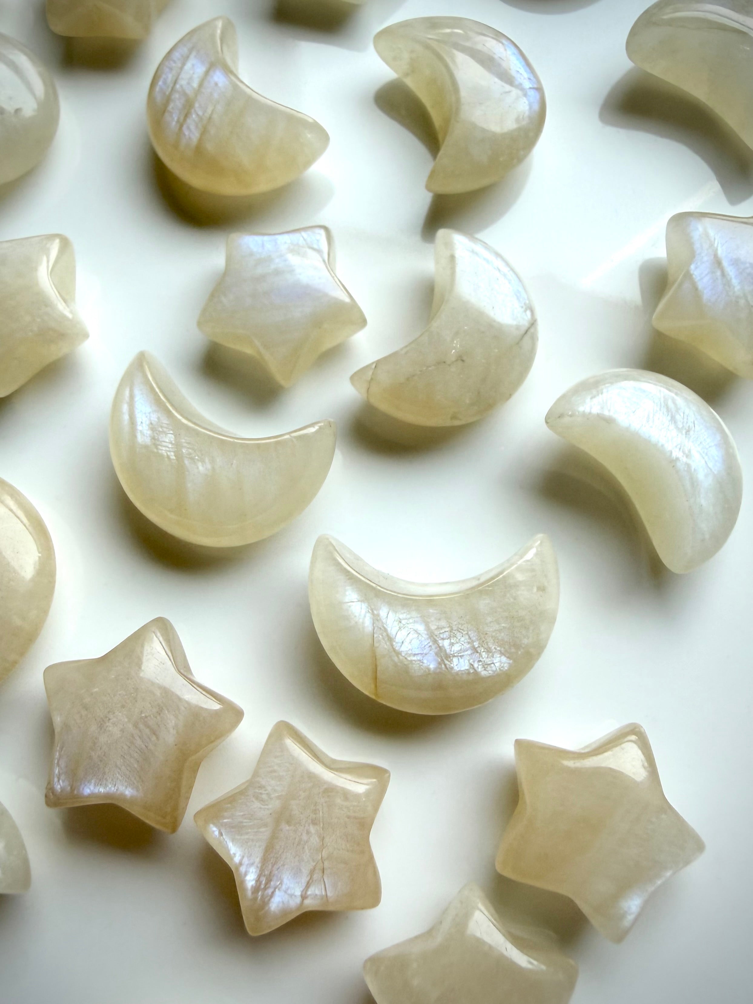 Mini Moonstone moon and star carvings with beautiful blue-white flash and natural feldspar texture