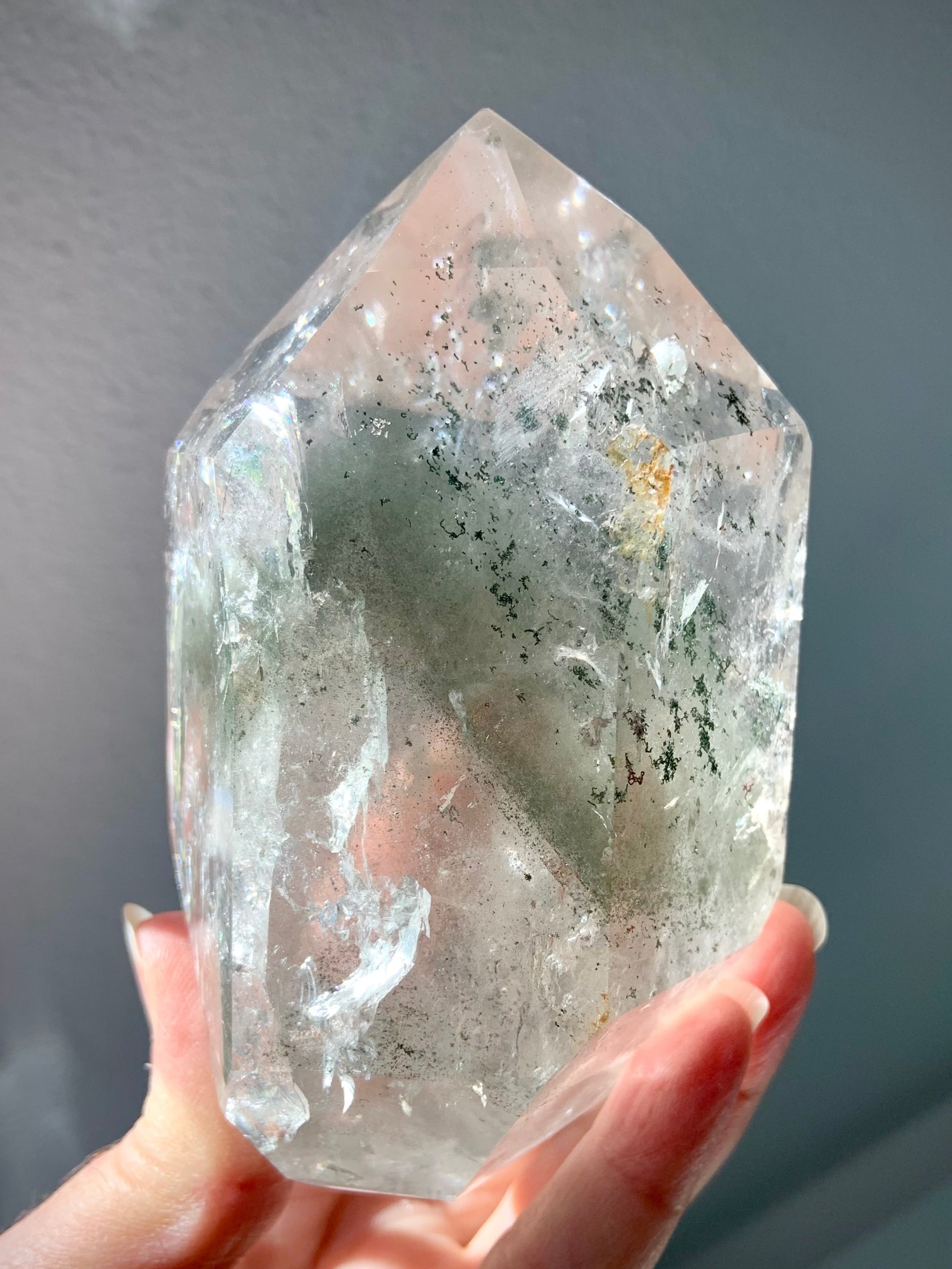 This Garden Quartz Crystal Tower has chlorite phantoms, mossy mineral inclusions + tons of rainbows
