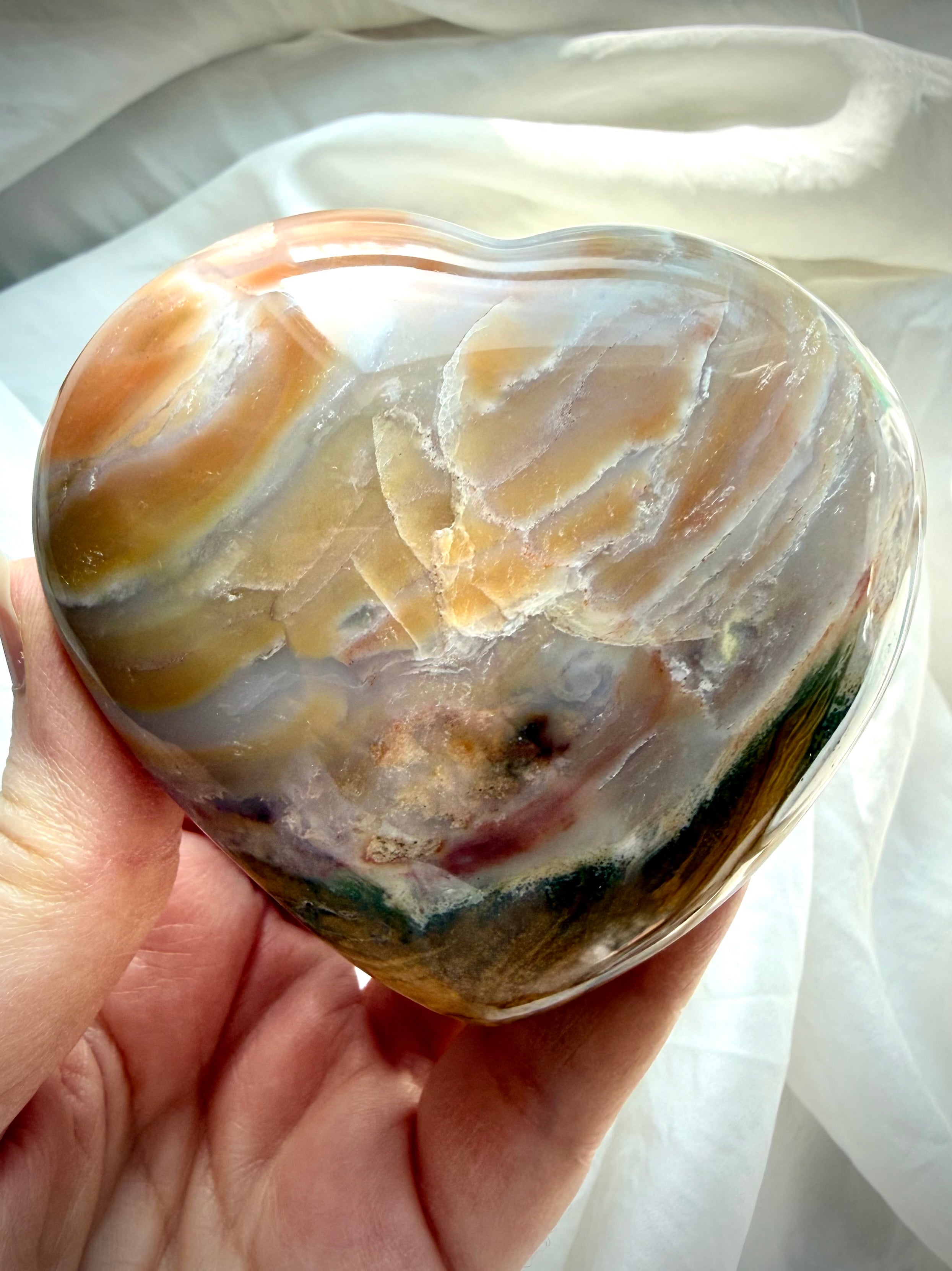 Polished Ocean Jasper heart featuring moss green, cream and rust-toned banding, substantial palm-size crystal