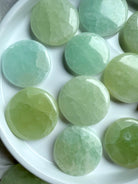 Smooth seafoam green Pistachio Calcite meditation stones with marbled texture – soothing crystals for heart chakra balance and inner peace