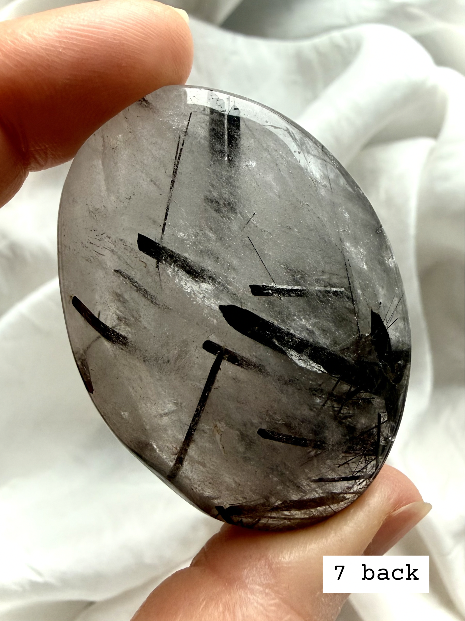 Black Tourmaline in Quartz palm stone 7 back view showing tourmaline needle inclusions