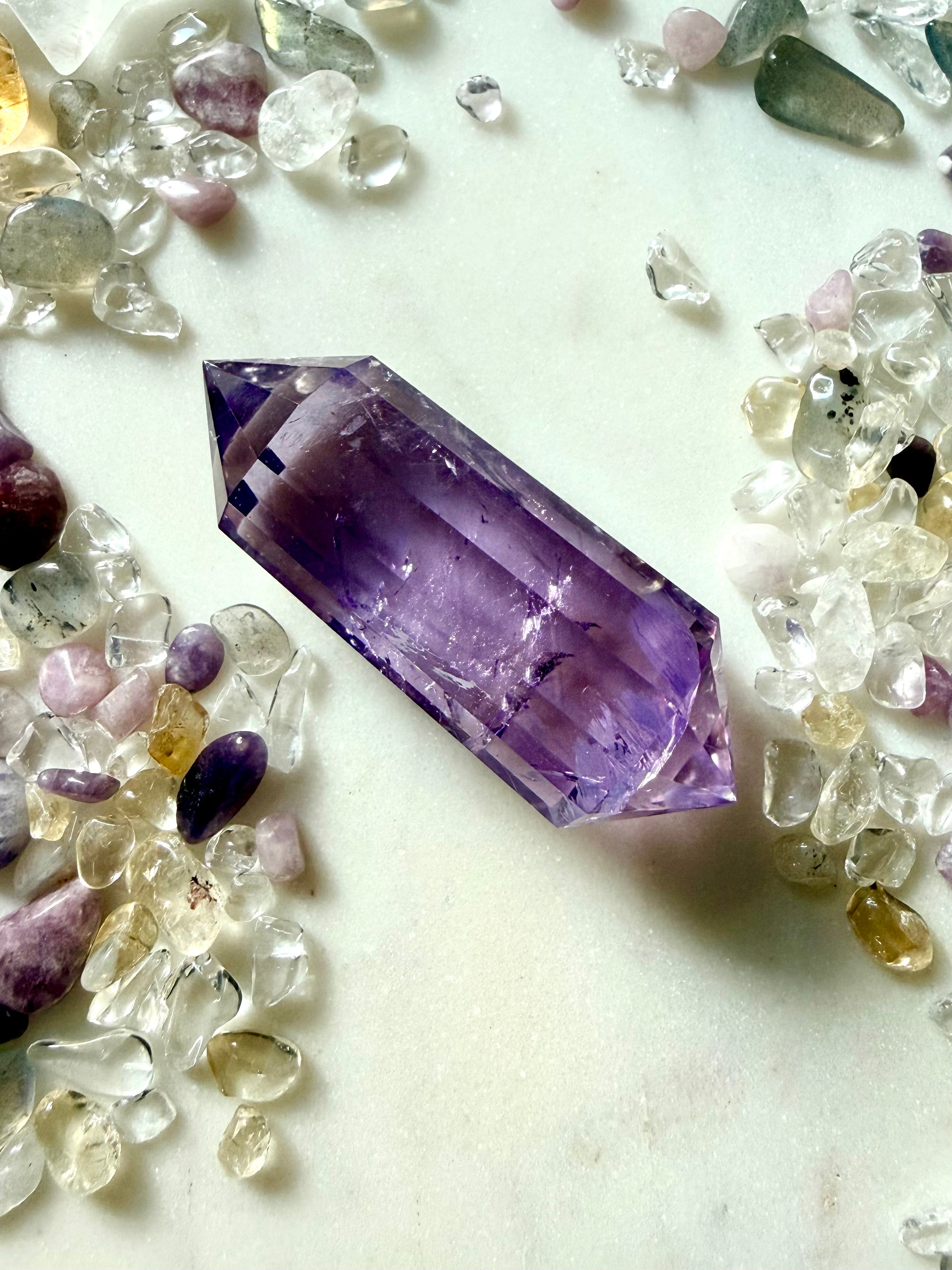 Double terminated 12-sided Amethyst Vogel crystal surrounded by Clear Quartz and gemstone chips