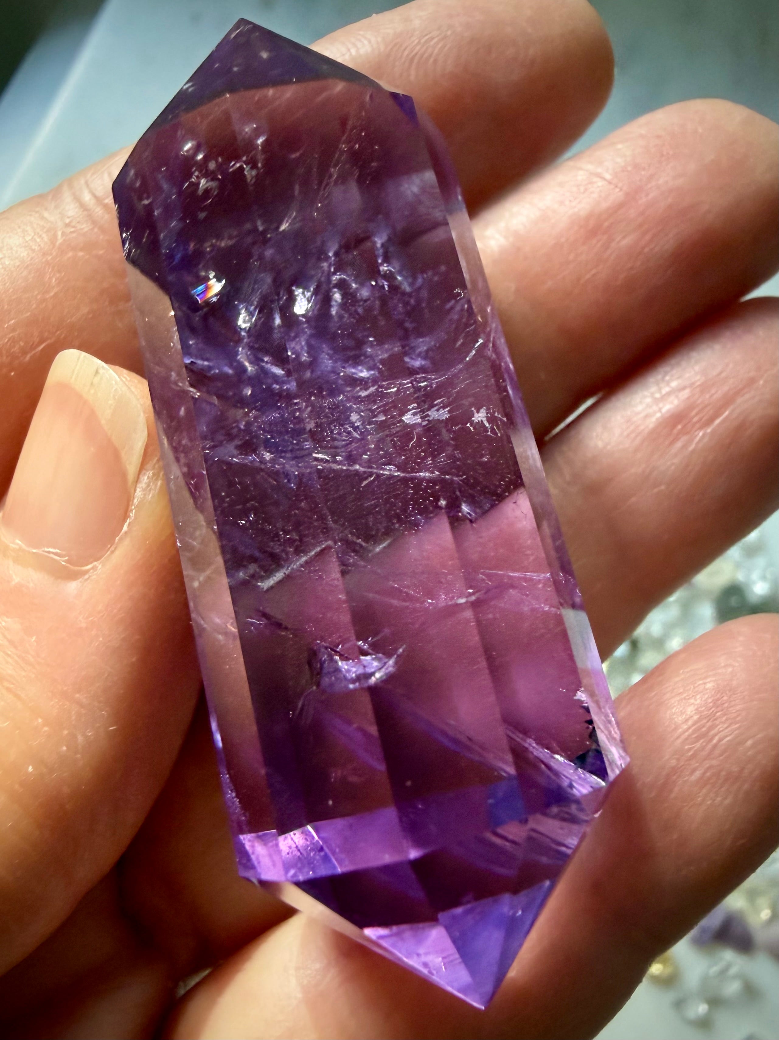 One-of-a-kind Vogel cut Amethyst crystal with luminous violet hues and interior rainbows