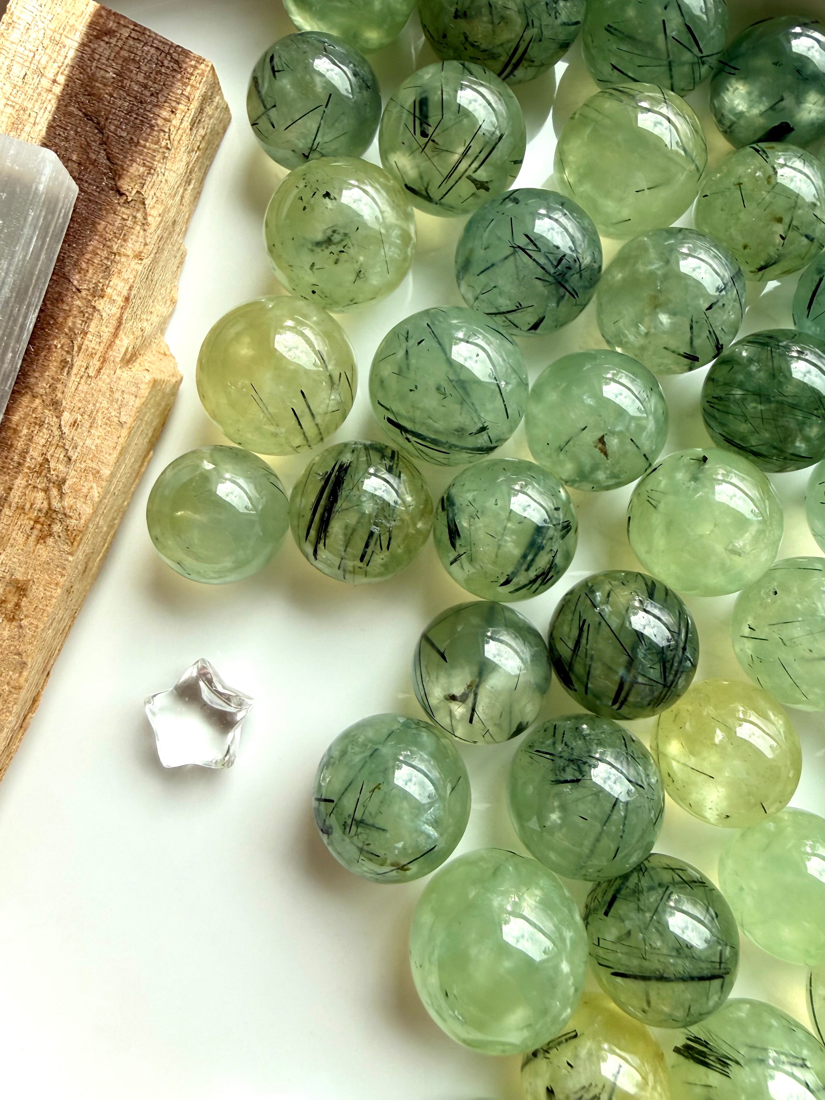 prehnite crystal spheres for calm clarity and intuition meditation with soft green tones and natural inclusion patterns