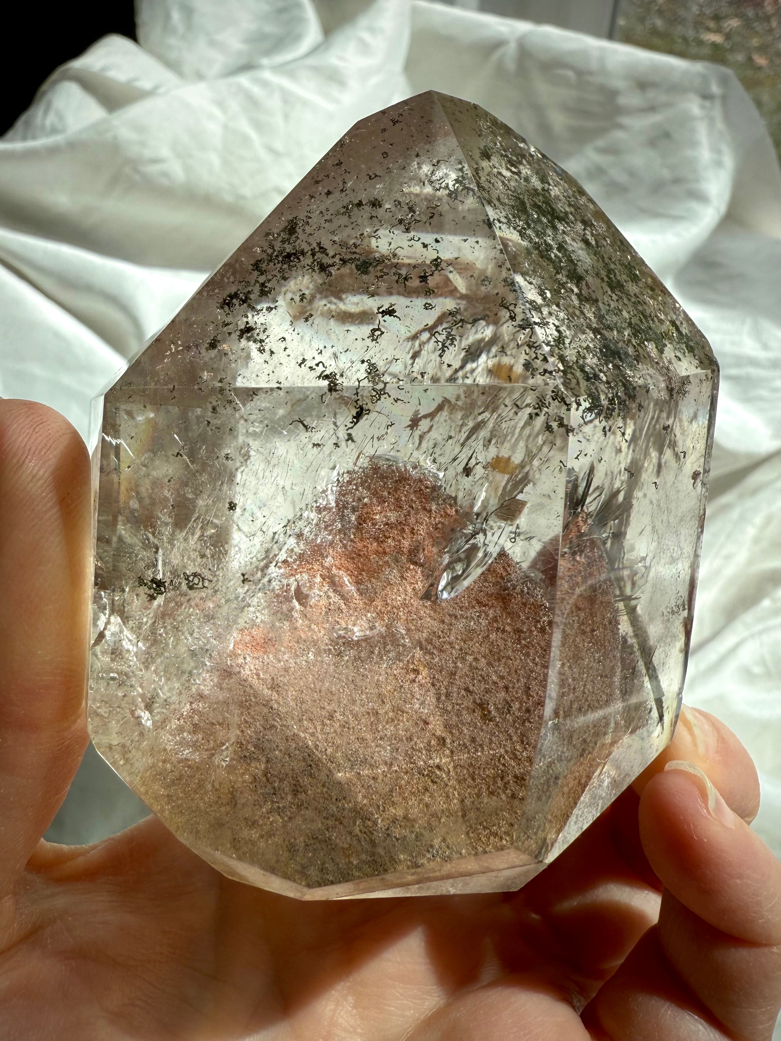 This Lodolite Garden Quartz Tower has a big reddish orange pyramid phantom, plus lots rainbows