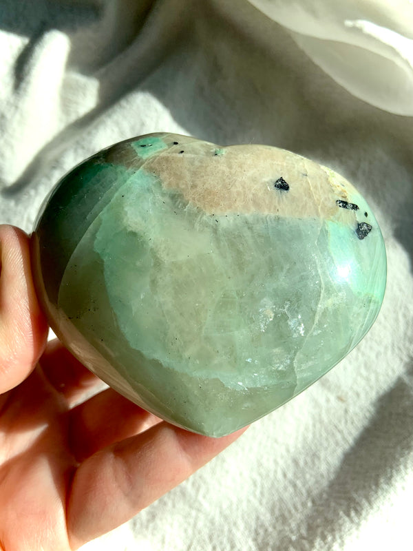 This Green Moonstone Heart has a soft green coloring + nice rounded shape for a meditation crystal.