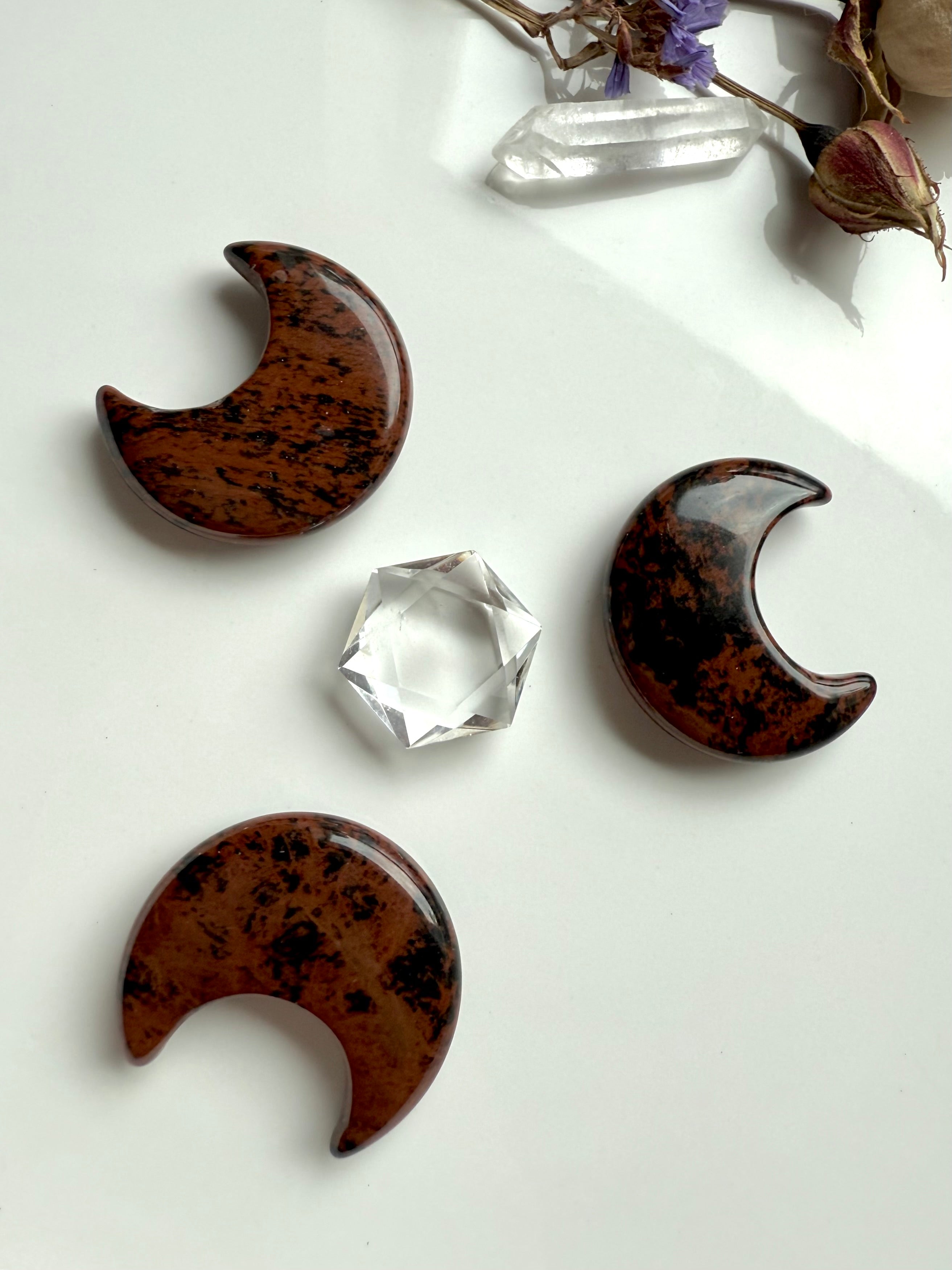 Crystal grid for energetic protection with Mahogany Obsidian moons and clear quartz hexagon center