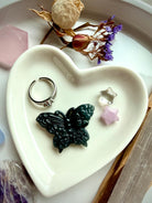 Wuji jade butterfly carving displayed on heart dish altar with Guatemalan jade crystal butterfly