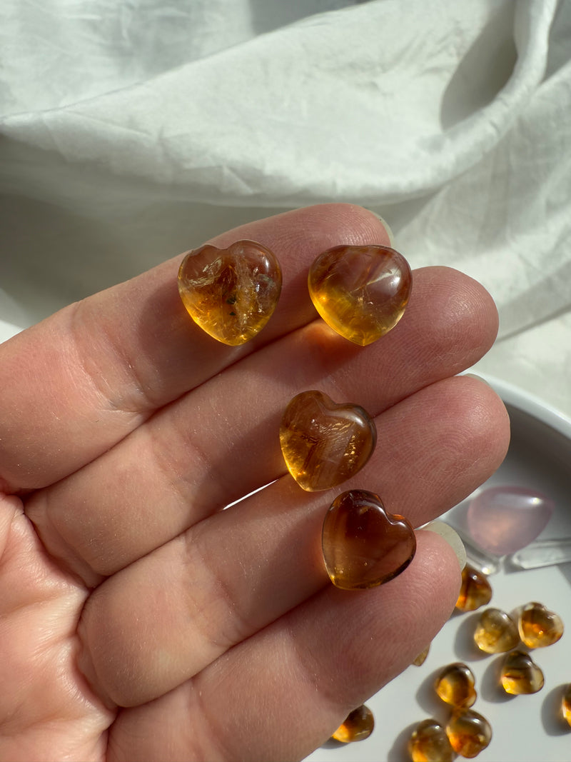 Mini Citrine Hearts shown on my hand for scale