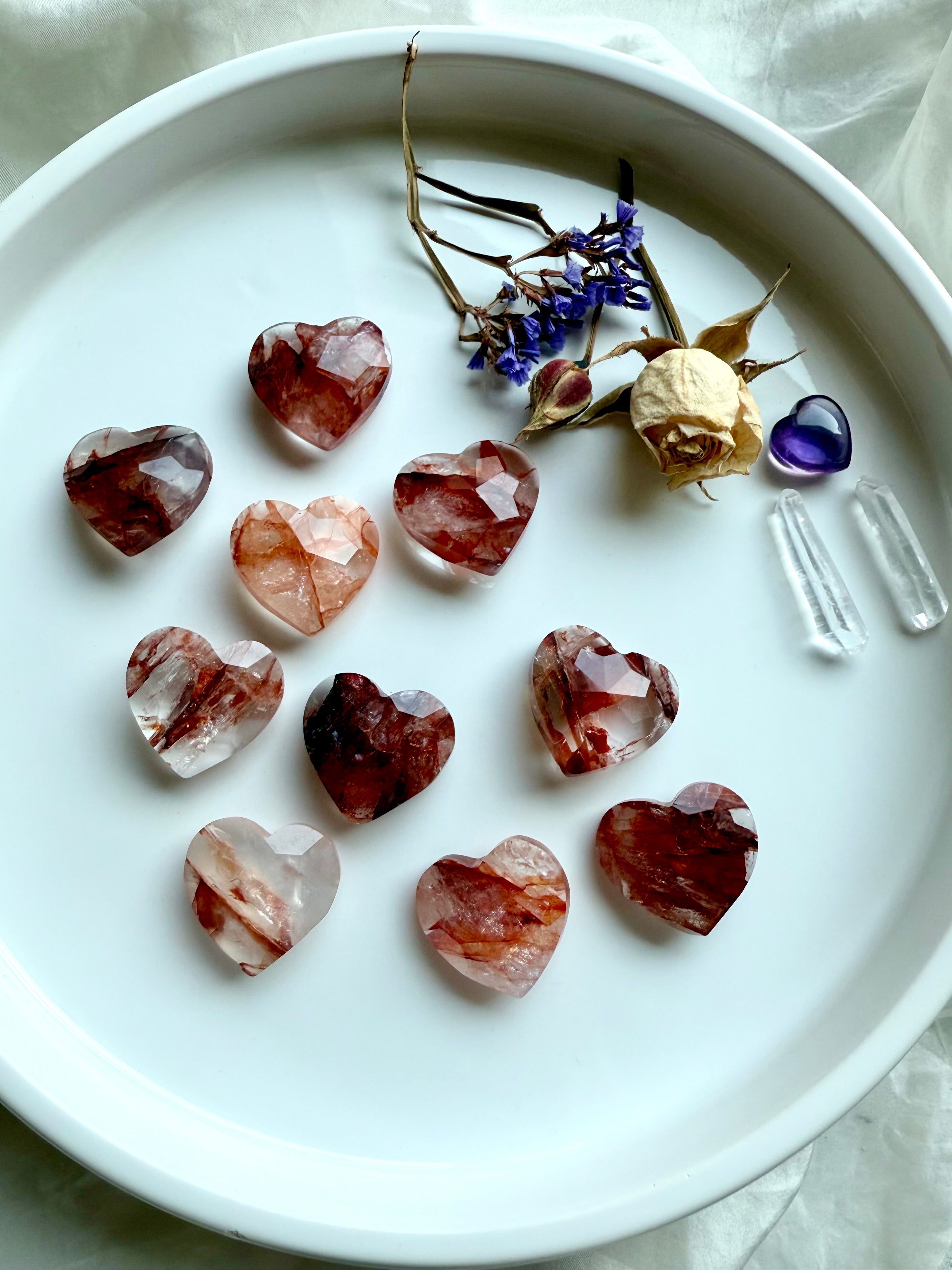 Mini Fire Quartz faceted heart styled with amethyst, quartz points, and flowers – sacral chakra healing crystals