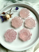 Rose Quartz lotus flower crystals styled with dried flowers and clear quartz, spiritual altar decor