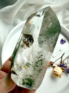 Natural Garden Quartz tower with chlorite phantoms, silvery flash, and scenic inclusions