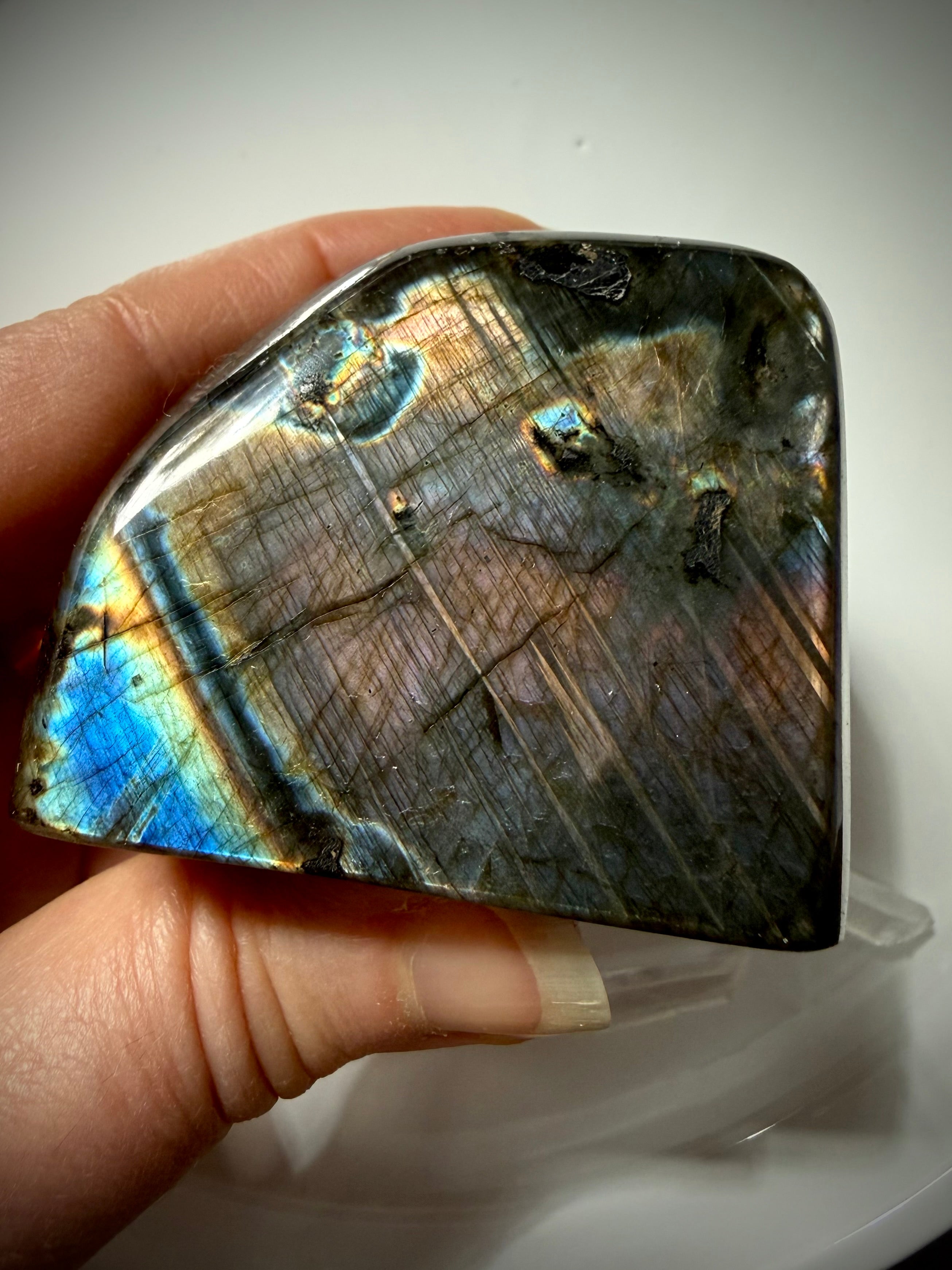 Rainbow Labradorite crystal showing vivid blue, purple and peach labradorescence