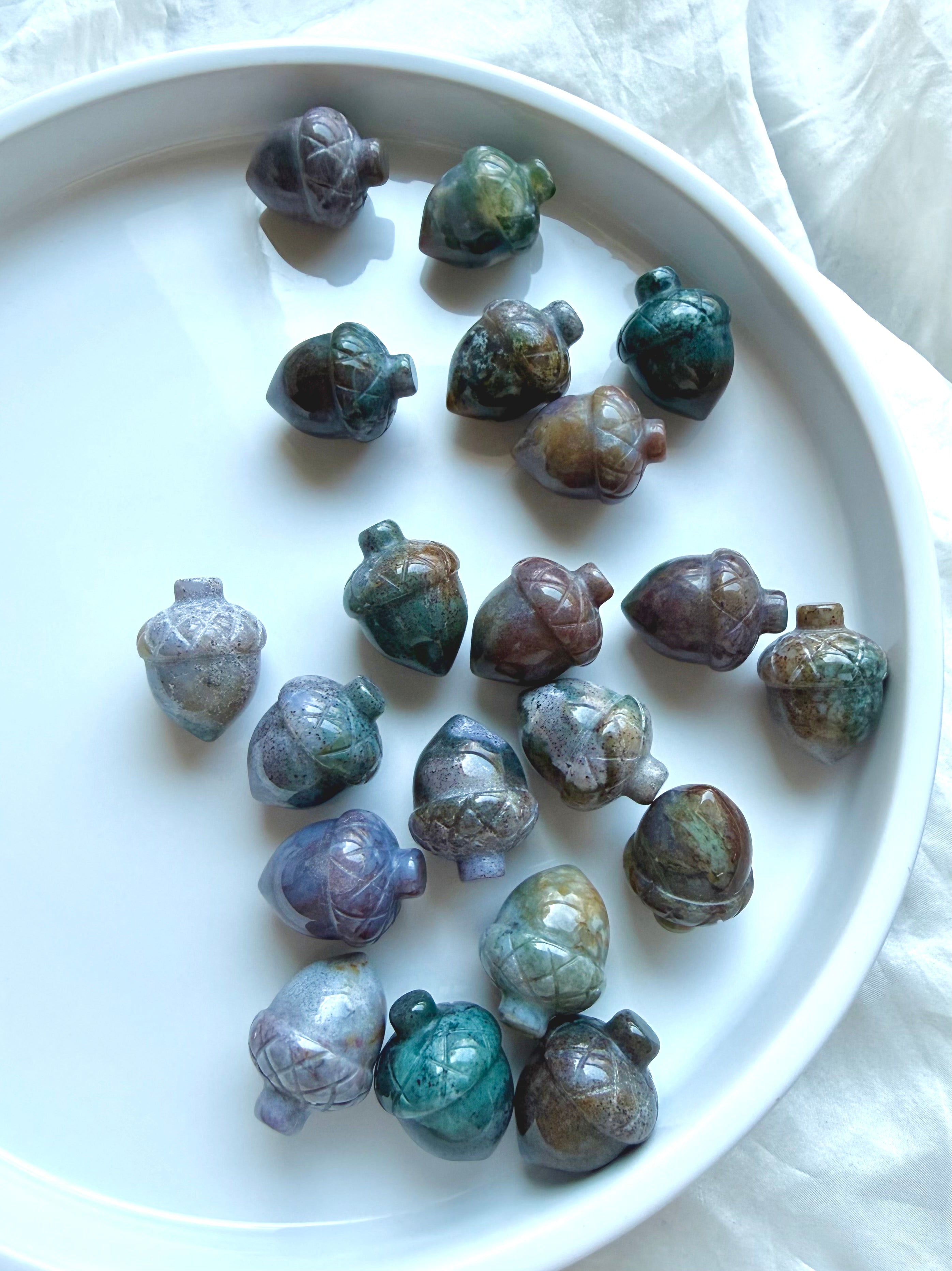 Small-batch Mini Ocean Jasper acorns displayed together showing their wide range of colors and unique natural patterns