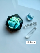 faceted labradorite hexagon with teal flash styled with quartz points labradorite star of david carving for third eye chakra activation