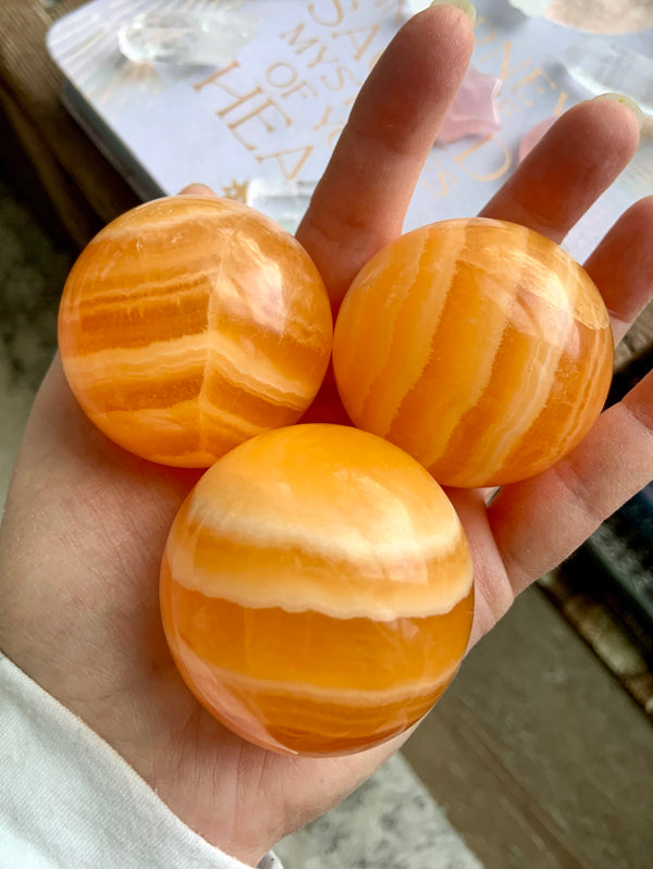 Sparkly Orange Calcite Spheres on Stand