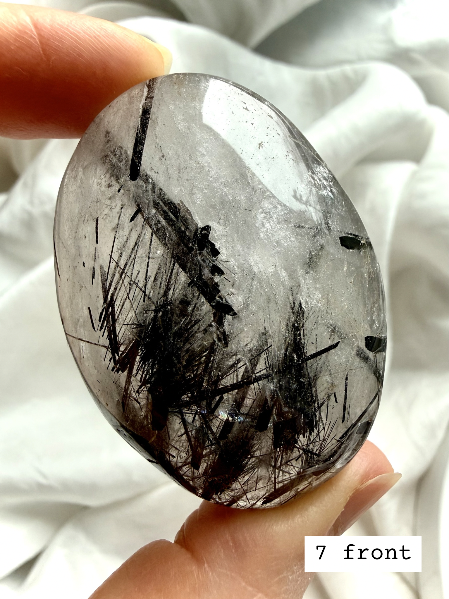 Black Tourmaline in Quartz palm stone 7 front view Tourmalinated Quartz protection crystal