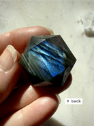 Faceted Labradorite hexagon crystal – sacred geometry hexagon for intuition, with luminous blue flash, back view