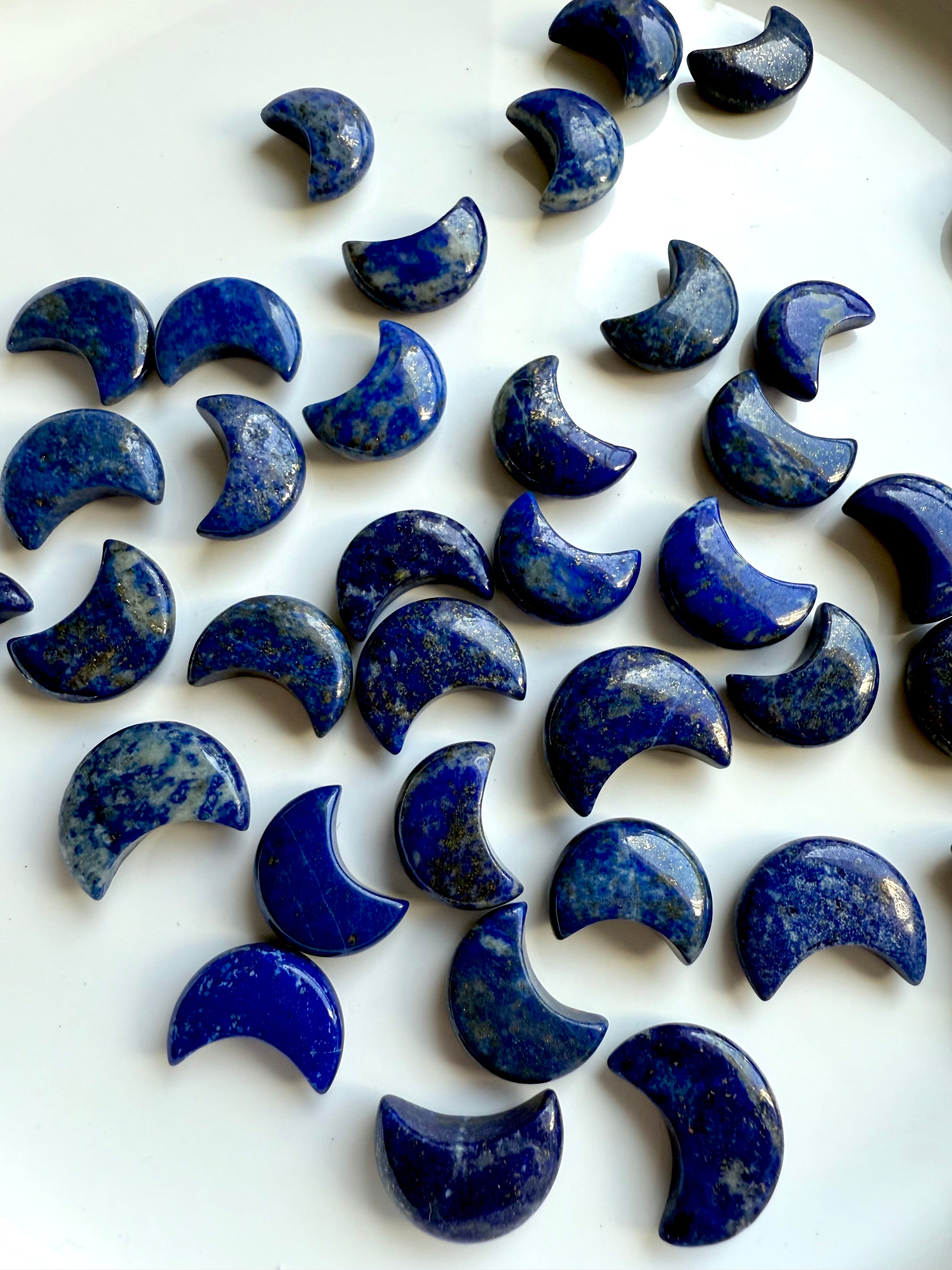 Lapis Lazuli crystal moons with glossy polish and celestial energy