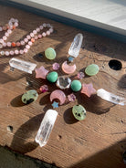 Clear Quartz Hexagon shown as the centerpiece in a crystal grid