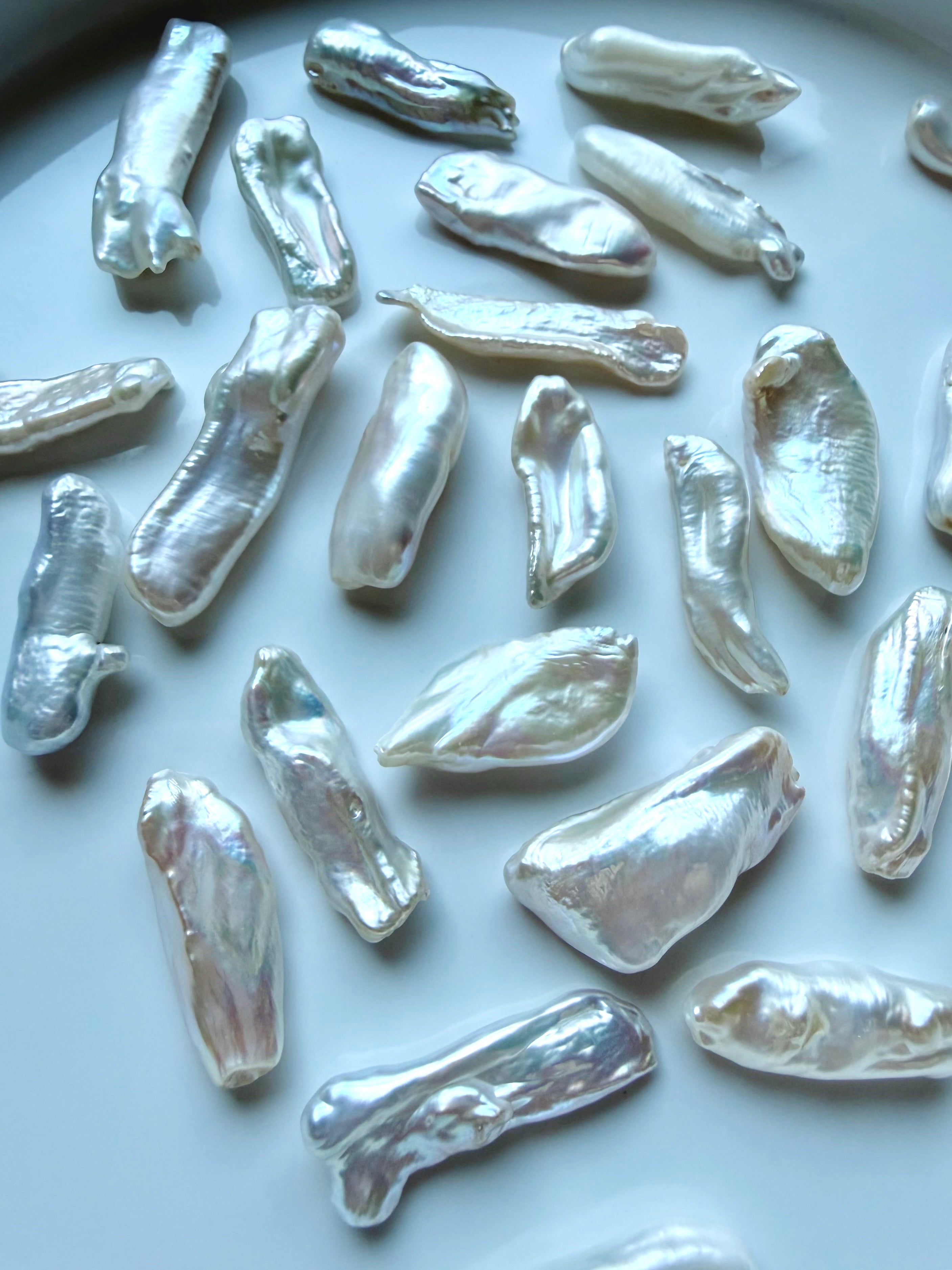 Loose freshwater Baroque Stick Pearls with silvery white luster, iridescence and unique natural shapes