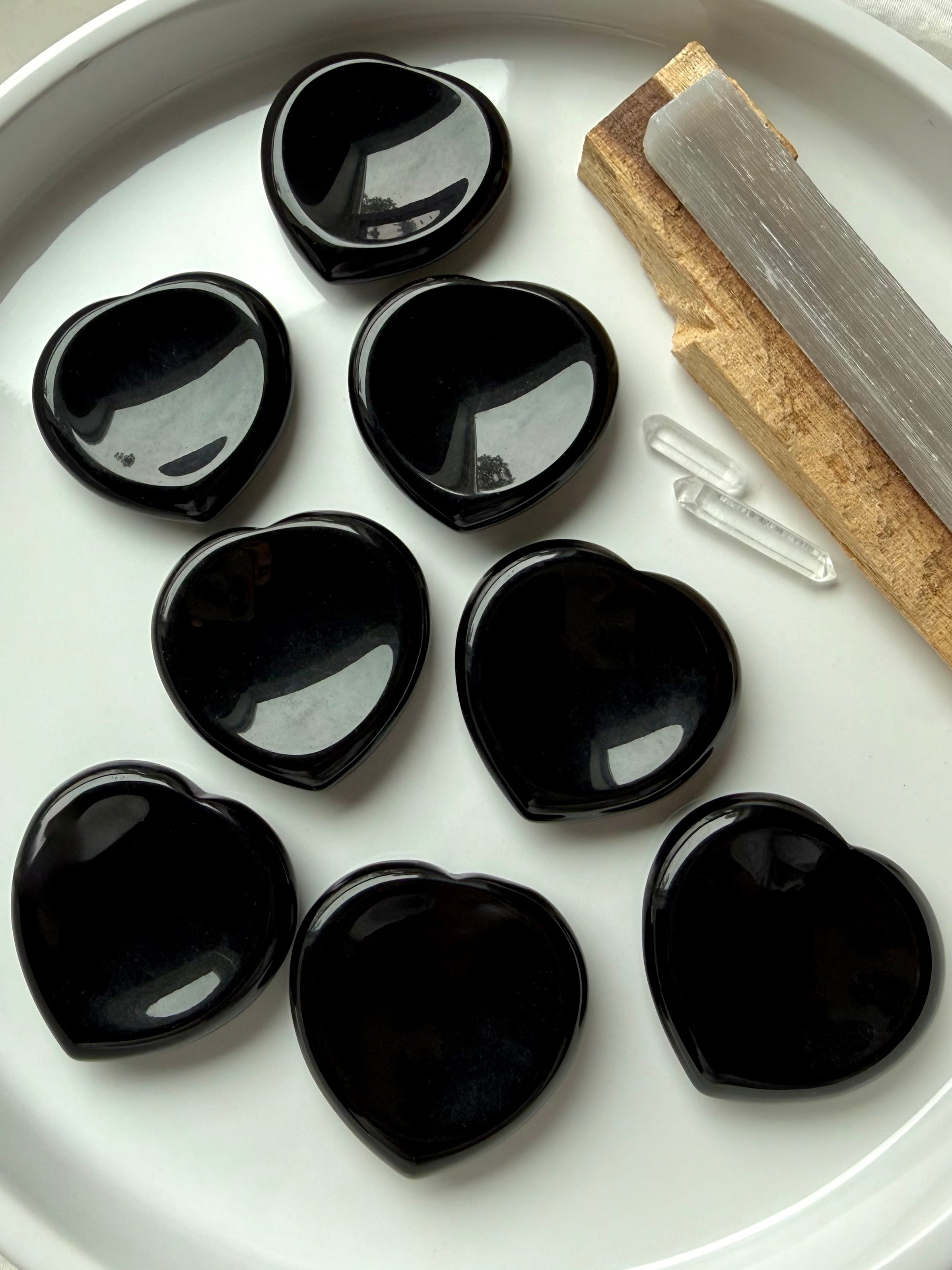 Natural black obsidian heart worry stones with thumb indentation