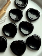 Polished black obsidian heart worry stones for anxiety and grounding